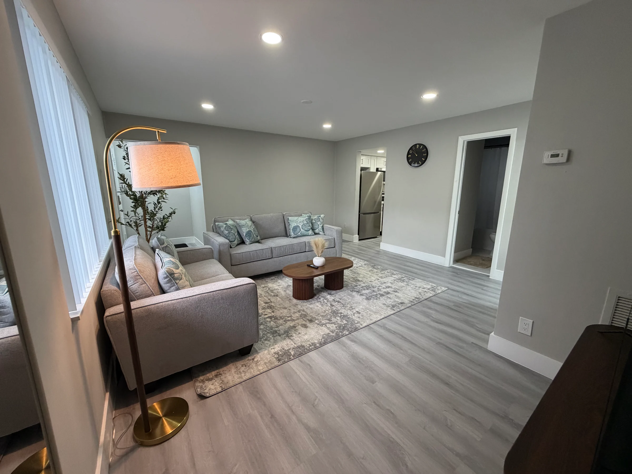 Furnished shared living room at Ocean Breeze Living.